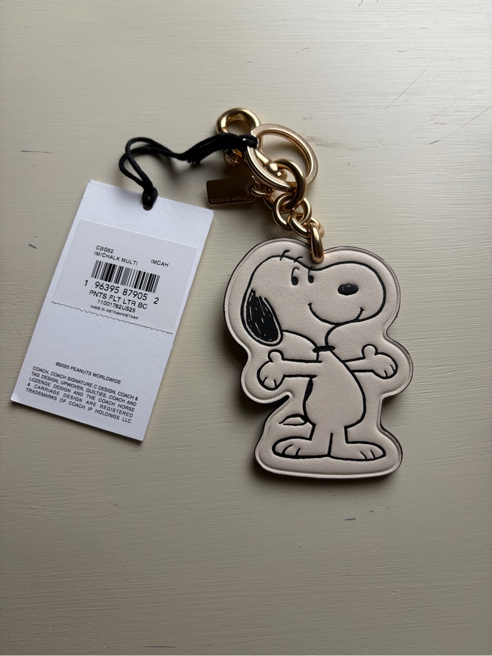 Coach Beige Snoopy Keychain Card Holder with Gold Hardware